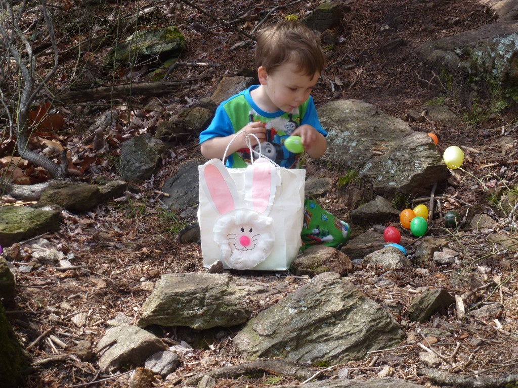 "Hiding" the eggs from Mommy.