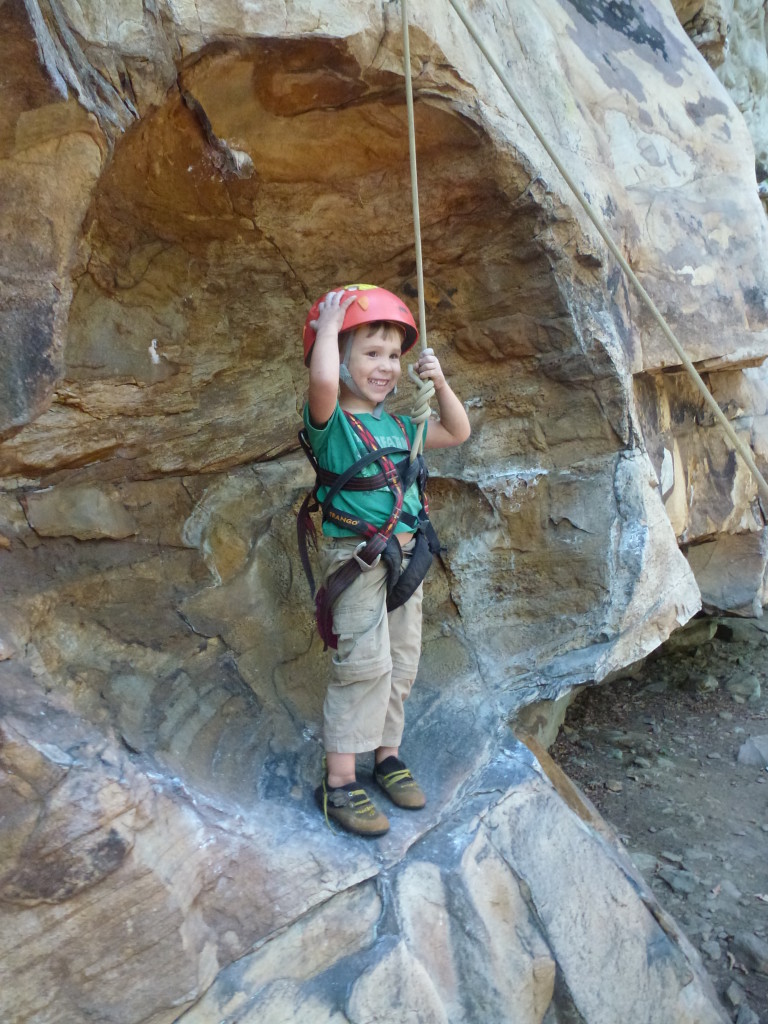 Happy kiddo hanging out in the giant hueco of The Wanderer (5.10a)