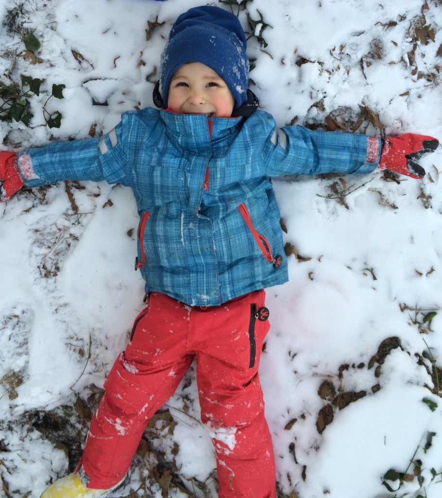 My little snow angel, decked out in his Ducksday gear.