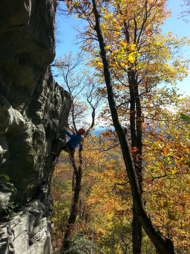 Steve finishing up Dimpsy-Dumpster 5.10, one of the few steep routes at crag.