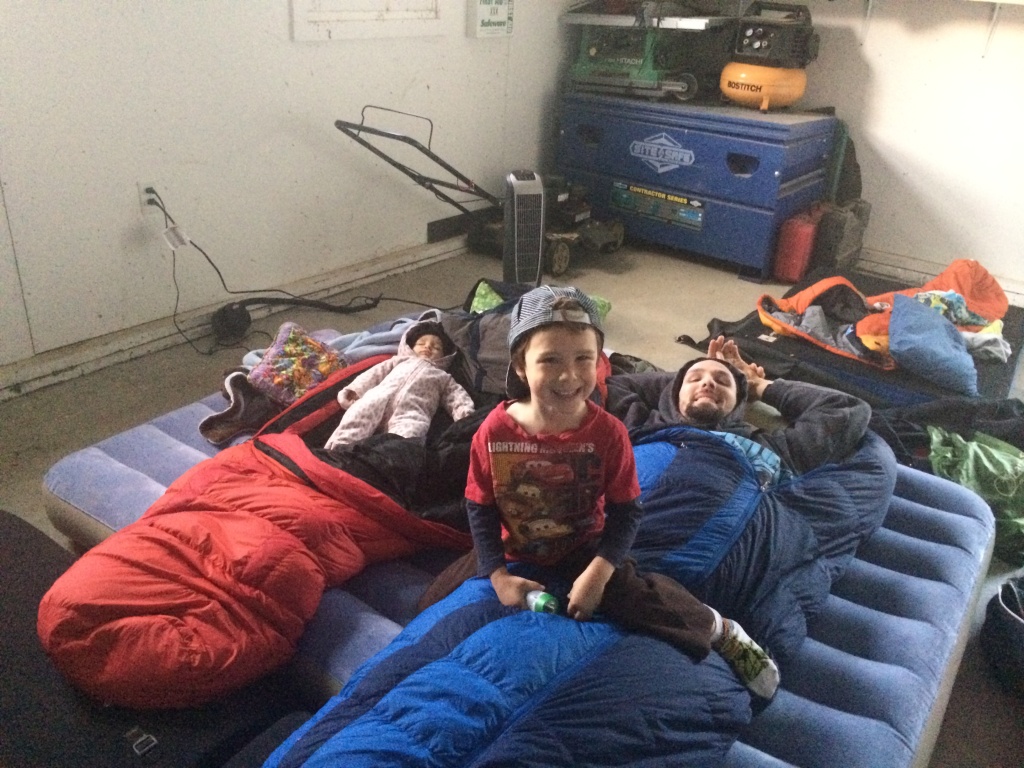 Dirtbaggin' it family style in a friend's garage. Much more comfortable than 30 degrees!