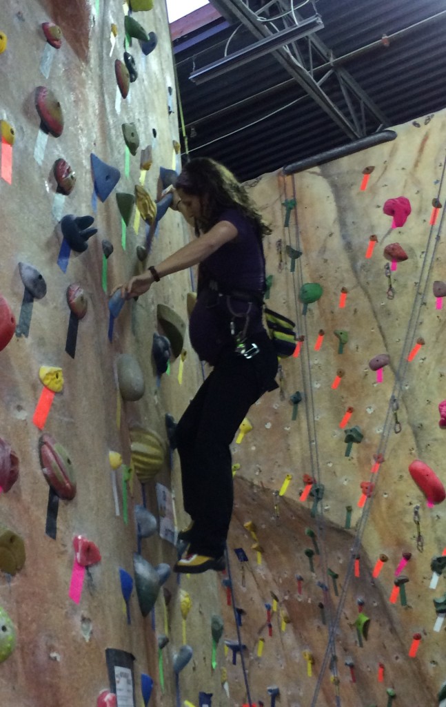 Running laps on the auto-belay at 34 weeks - Orca Top and Leah Pants