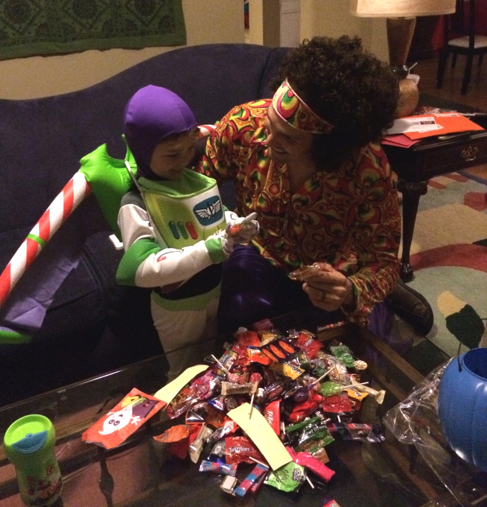 Buzz Lightyear and Jimi Hendrix analyzing their spoils.