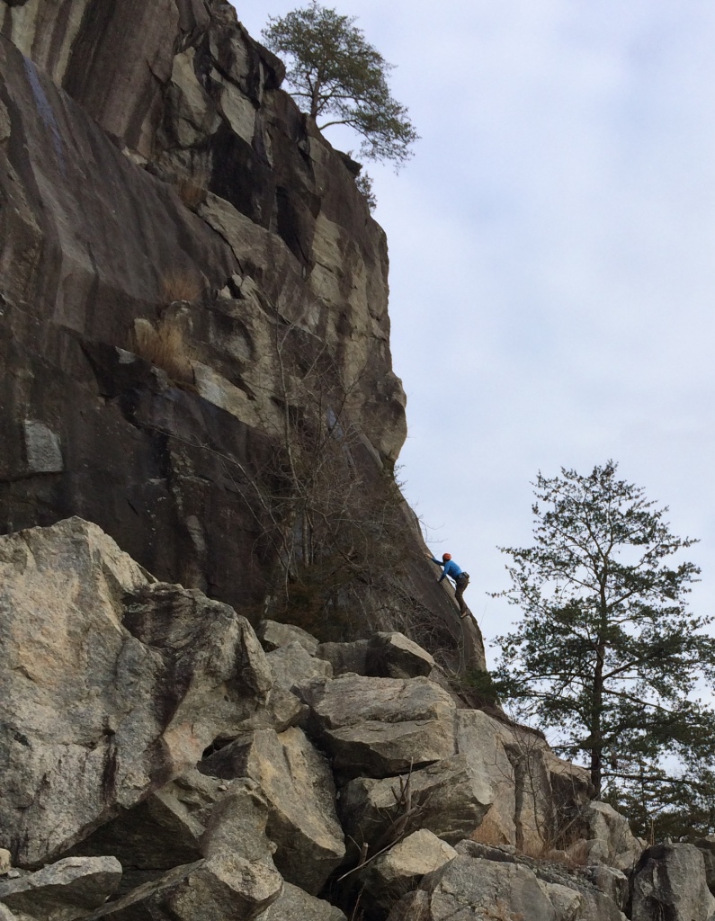 Crag-Daddy creeping up the slab of Somebody Get Me a Dew 5.11b