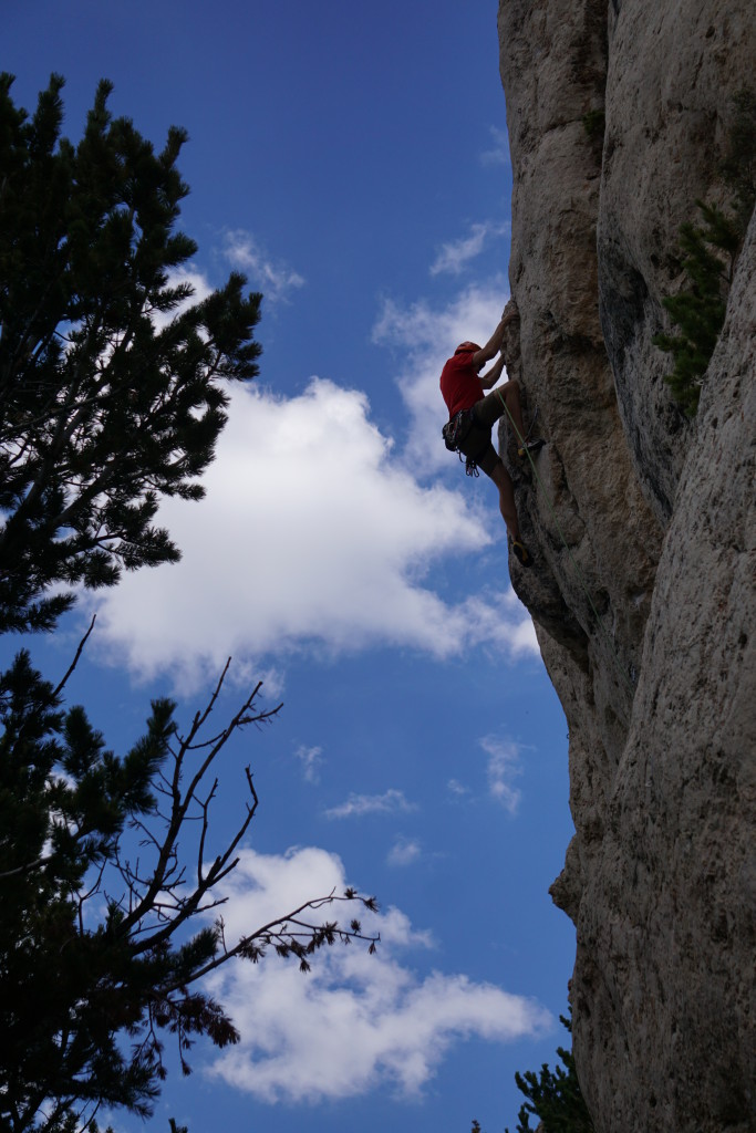 Steve fighting through the crux on Hot Tamale Baby 12a