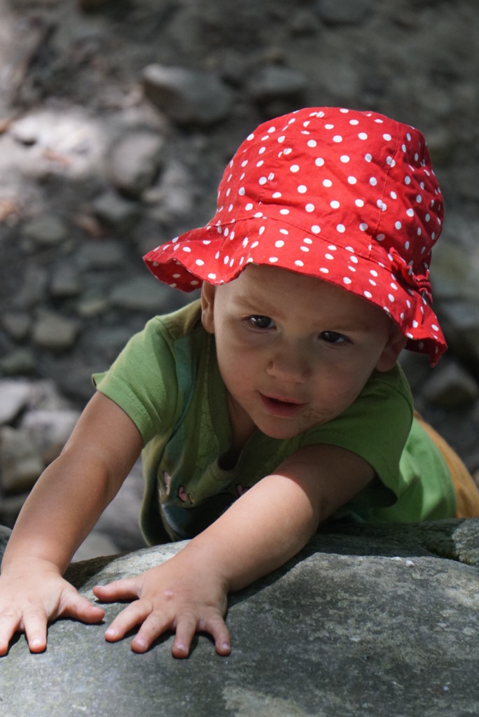 Baby Zu focused on a boulder problem at the base...
