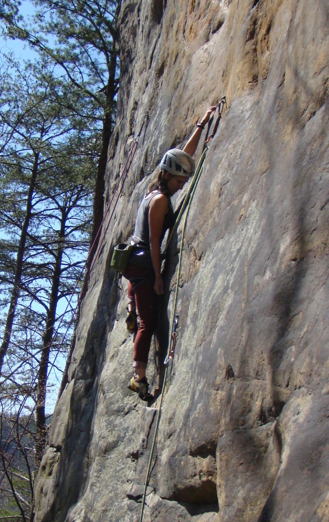 Stretching tall on Techman 5.12c at the New River Gorge