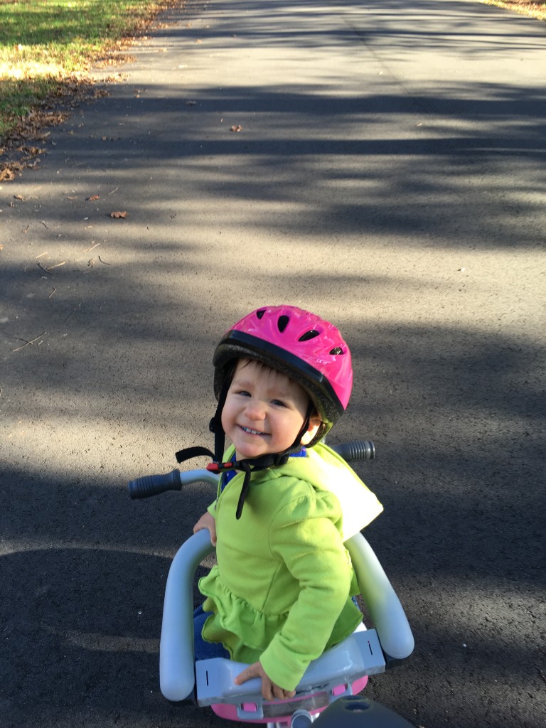 Styling in the Tricycoo with her Joovy Noodle Helmet.