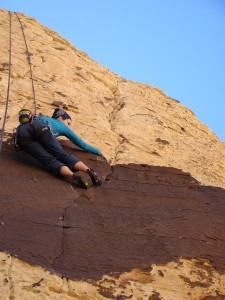 Precarious laybacks thru the crux of Foreman Ferris (5.11b)